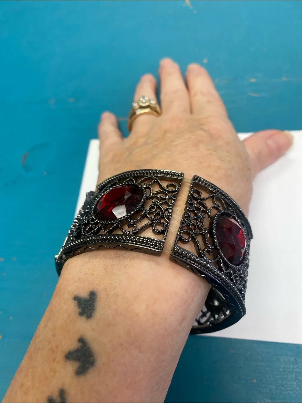 Black Filigree Cuff Bracelet with Red Gemstone